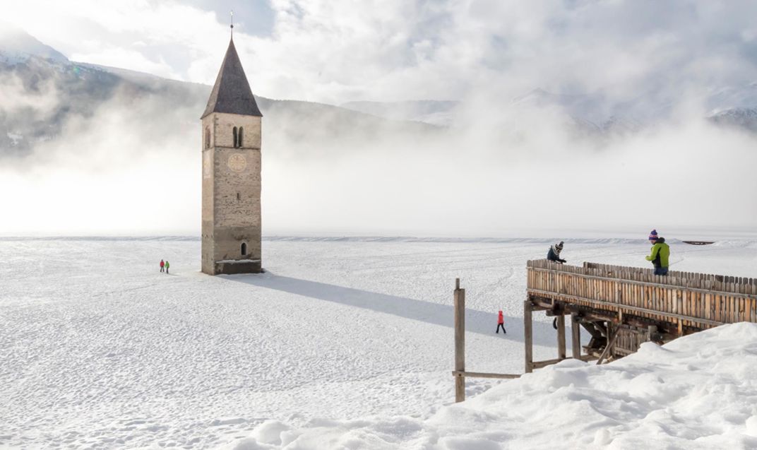 winter-kirchturm-reschensee-vinschgau-idm06335frbl